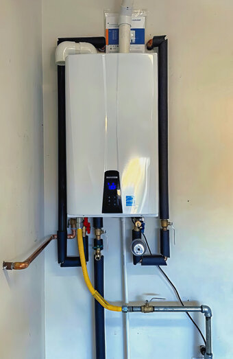 https://westminsterhotwater.com.au/uploads/2025/06/instant-hot-water-systems-63860.jpg